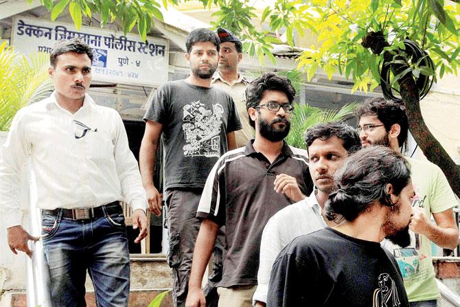Policemen escort the arrested FTII students  to court, which eventually granted them bail. pic/PTI