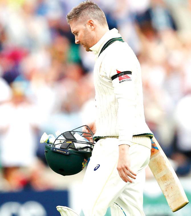 Michael Clarke walks back after being out for 15 yesterday. Pic/Getty Images