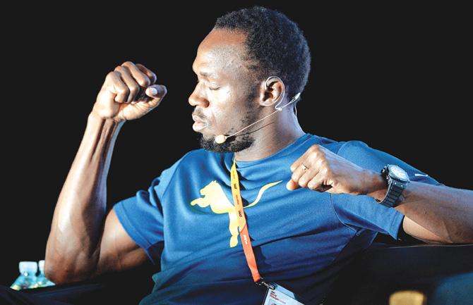 Sprint king Usain Bolt gestures during a press conference ahead of the IAAF World Championships meet in Beijing yesterday. Pic/AFP