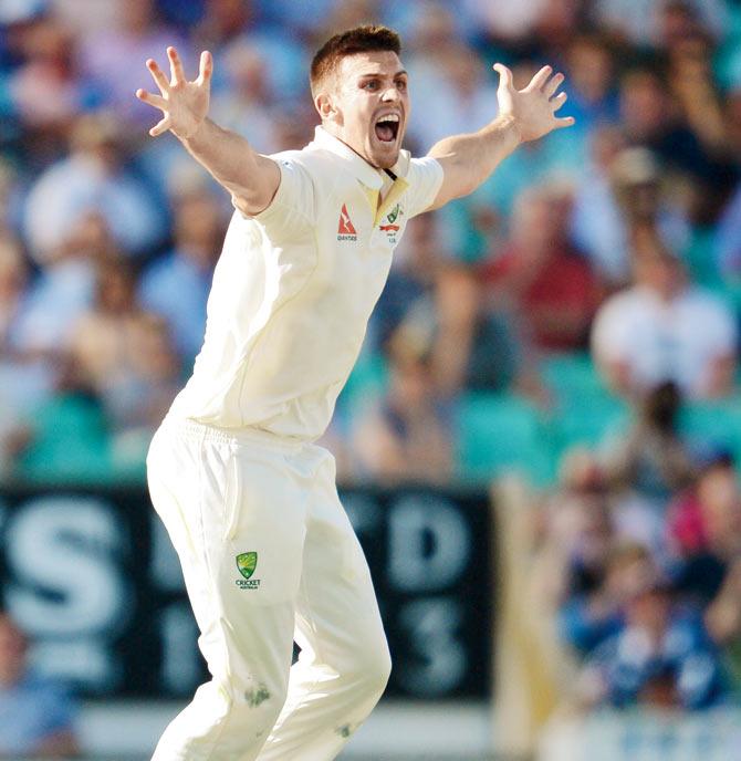 Mitchell Marsh successfully appeals for the wicket of England’s Joe Root. Pic/AFP