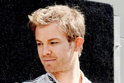 Nico Rosberg unhurt after tyre blow-out; tops practice