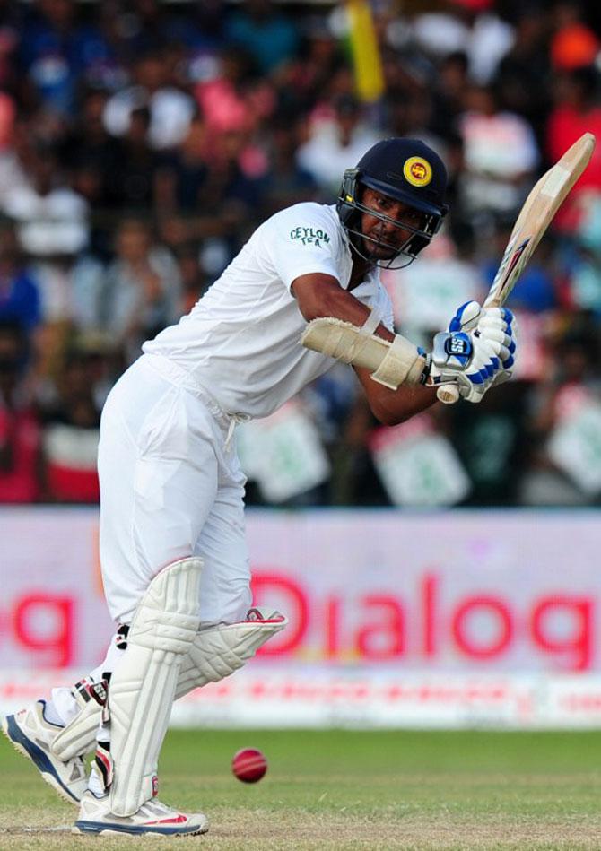Sri Lankan cricketer Kumar Sangakkara plays a shot during the fourth day of their second test match between Sri Lanka and India at the P. Sara Oval Cricket Stadium in Colombo on August 23, 2015. Pic/AFP