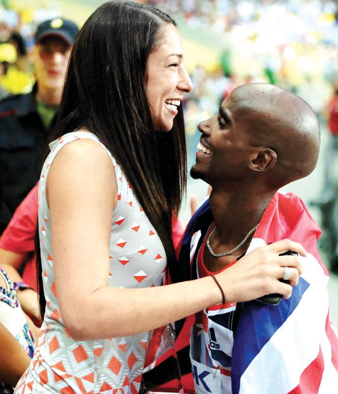 Mo Farah with wife Tania Nell during the 2013 World Championships in Moscow. Pic:Getty Images