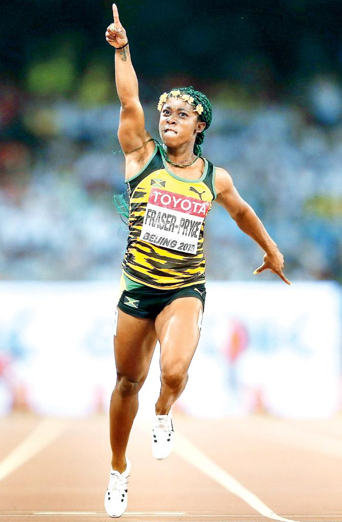 Shelly-Ann Fraser-Pryce reacts after crossing the finish line at the Beijing National Stadium yesterday. Pic/Getty Images