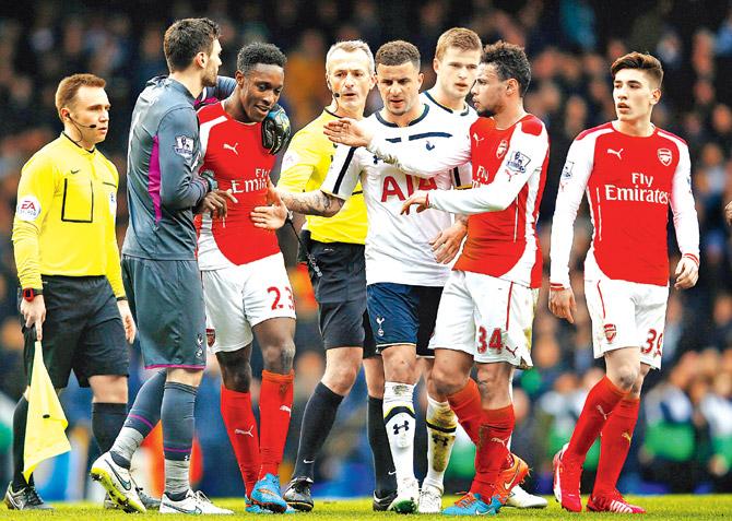 Fiesty affair: Arsenal and Tottenham Hotspur players argue during their EPL clash at White Hart Lane on February 7. Pic/Getty Images