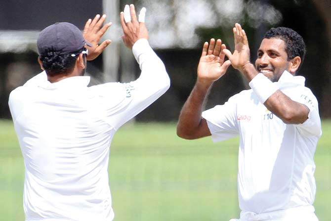 Dhammika Prasad celebrates the wicket of R Ashwin during third Test in Colombo on Saturday. PIC/ SOLARIS IMAGES