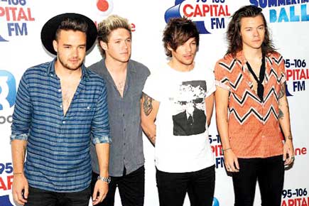 Simon Cowell wants One Direction to perform at 'The X Factor'