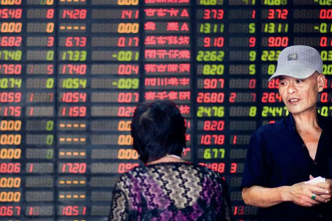 CHINESE CAUSE: The Sino markets have been causing ripples across the world economy. PIC/AFP