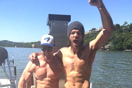 Jared Padalecki and Stephen Amell show off abs for a cause