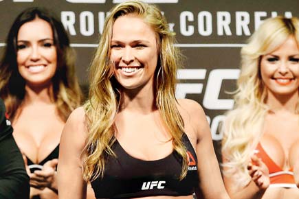 It's fights, camera, action for UFC star fighter Ronda Rousey!