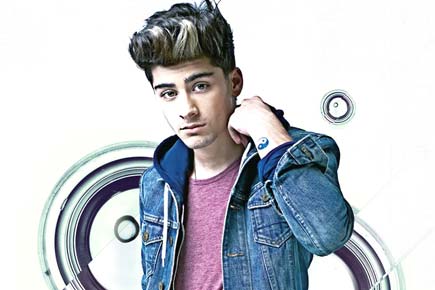 Zayn Malik ended engagement over text?
