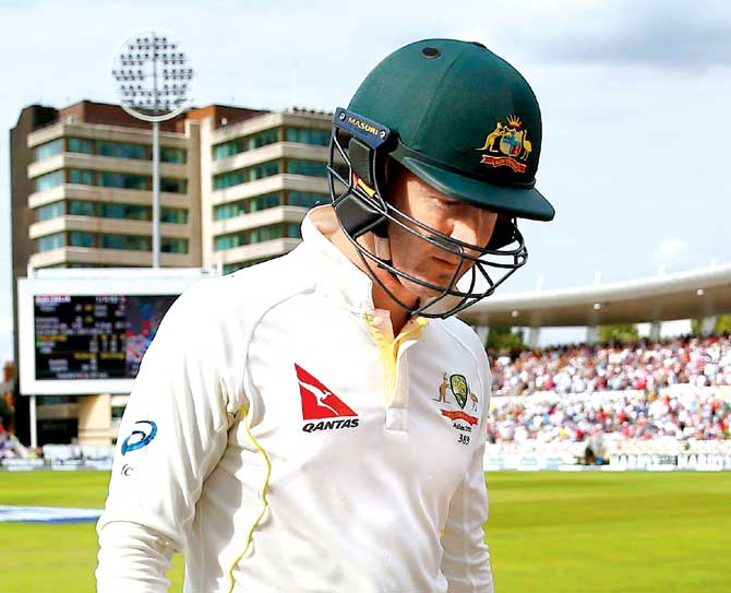 A disappointed Australian skipper Michael Clarke walks back after being dismissed for 13 in the second innings at Trent Bridge yesterday. He was out for 10 in the first innings. Pic/Getty Images