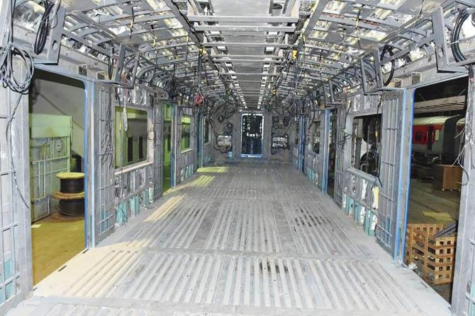 The interiors of an under-construction AC coach