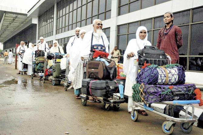 Haj pilgrims wait for the flight to Saudi Arabia from the Ahmedabad airport. Air India will start Haj flights from Mumbai on September 10. Pic/PTI