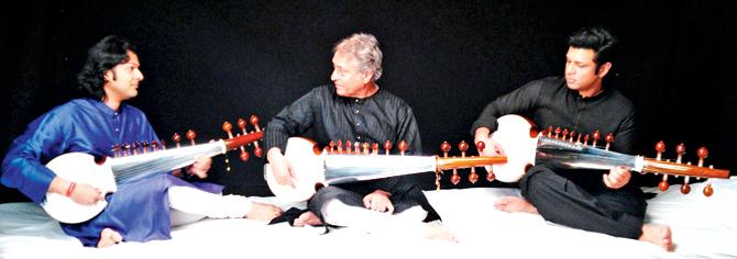 FAMILY IN SYNC: Ayaan Ali Khan (left) along with Ustad Amjad Ali Khan and brother Amaan Ali Khan