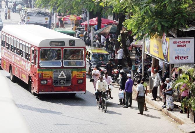 BEST buses between Bandra and Kurla will have a dedicated lane. With vehicles being parked near bus stops currently, buses are forced to stop in the middle of the road. File pic for representation