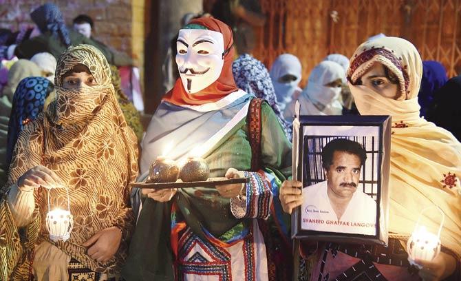 Pakistanis participate in a vigil for missing family members on Baloch Martyrs Day, November 13, 2014, in Quetta. Tweets by Baloch nationalists speak of their tragedy, sorrow and forlorn hope; of missing sons, husbands and fathers, torture and staged encounters. Pic/AFP