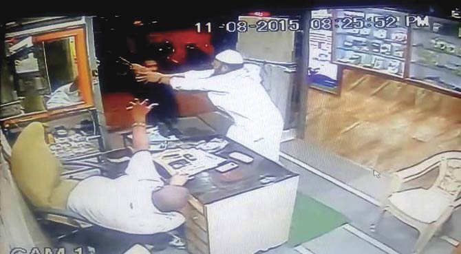 CCTV footage shows the customer leaping to save Rajnish