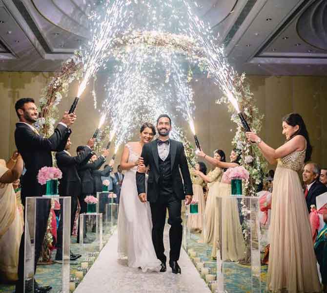 Dinesh Karthik and Dipika Pallikal walk down the aisle after their wedding