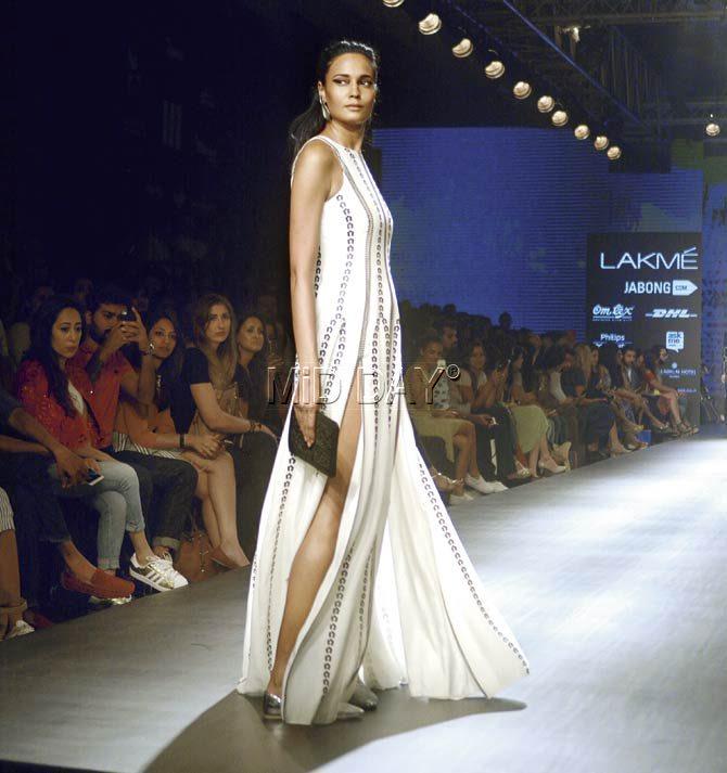 A model showcases a gown from AM:PM’s largely monochrome collection. Pic/Pradeep Dhivar