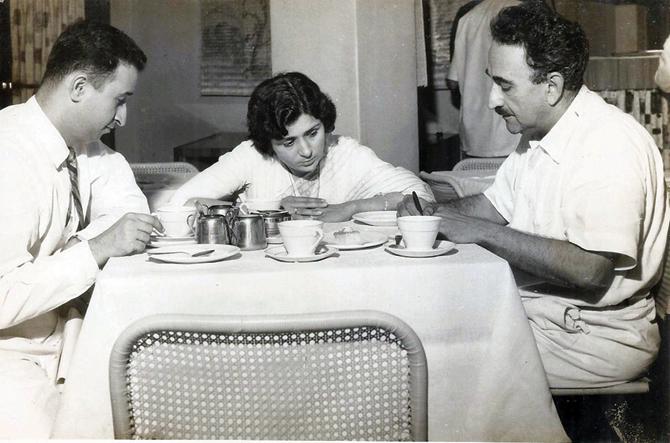 Ruby and Burjor Patel take notes from Adi Marzban (right) at a Churchgate café in the 1960s.  Pic courtesy/Burjor Patel