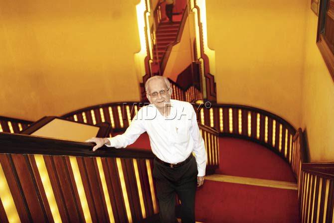 Nazir Hoosein, owner, on the resplendent staircase of Liberty, the Showplace of the Nation. Pics/Suresh KK