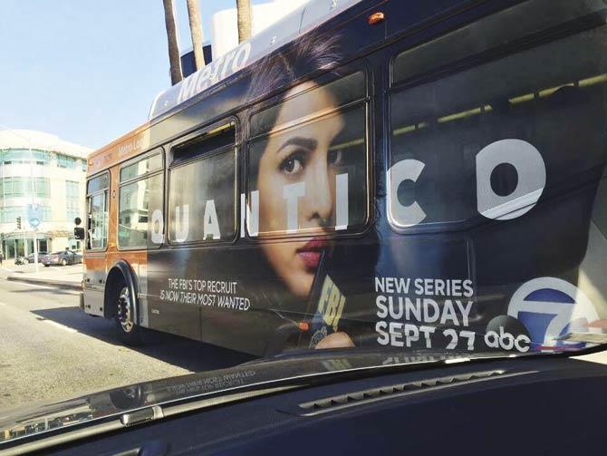 A poster of Quantico on a bus