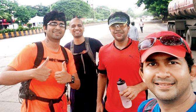 Ved with friends who supported him through the run.