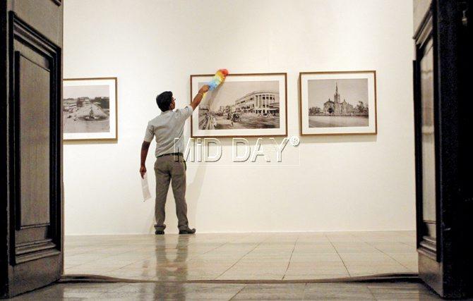 Organisers give finishing touches to few vintage photographs of Asia from the 19th century at Dr Bhau Daji Lad Mumbai City Museum. Pics/Tushar Satam
