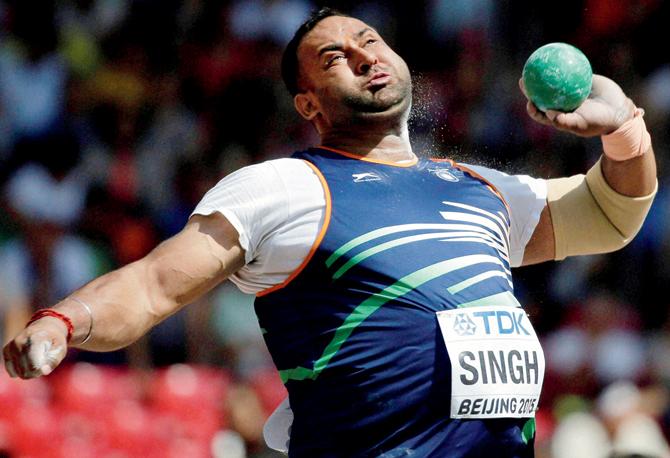 India’s Inderjeet Singh competes in the shot put event