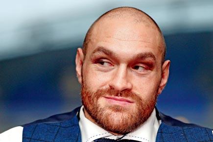 Brainless Tyson Fury says a woman's best place is the kitchen