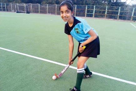 Six months into game, Roomel gets picked in state's U-14 hockey team