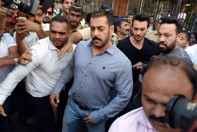 Bollywood actor Salman Khan walks from Bombay High Court in Mumbai on December 10, 2015, after being acquitted of culpable homicide. Pic/AFP