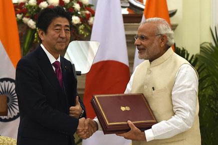 Narendra Modi-Shinzo Abe ink pacts on bullet train, defence, nuke energy