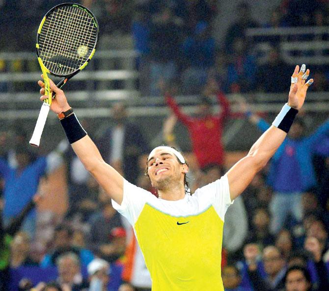 Rafael Nadal celebrates after beating Roger Federer during the New Delhi leg of IPTL on Saturday. Pic/PTI