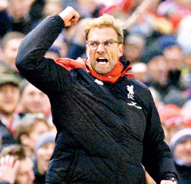 Liverpool manager Jurgen Klopp celebrates their late equaliser vs West Bromwich Albion. Pic/AFP
