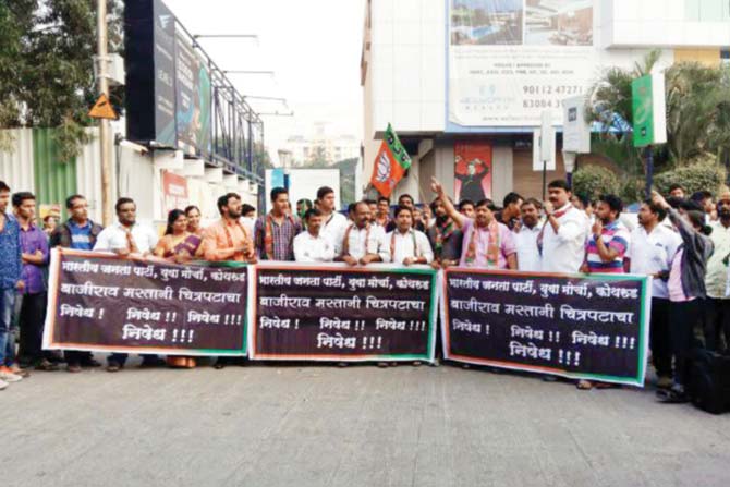 Members of the BJP and its youth wing protesting outside City Pride multiplex in Kothrud yesterday