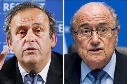 FIFA bans Sepp Blatter and Michel Platini from all football activities for eight years