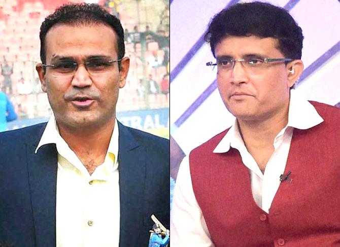 Virender Sehwag and Sourav Ganguly. Pics/PTI