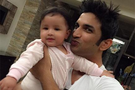 Cute click! Sushant Singh Rajput with MS Dhoni's daughter Ziva