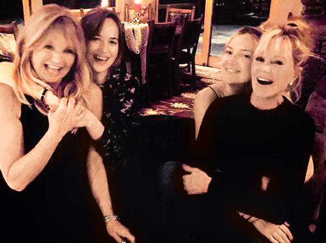 Kate Hudson (second from right) and Dakota Johnson (second from left)