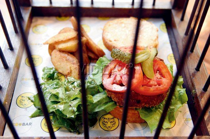 Veg Kheema and Aloo Kebab Burger served in a cage. Pics/Nimesh Dave