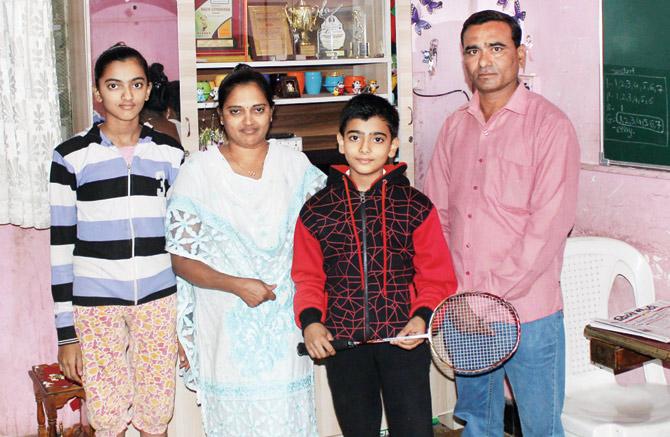 Prajwal Sonawane at his home with family members