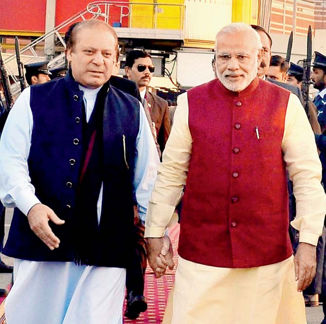 Prime Minister of Pakistan Nawaz Sharif with Prime Minister Narendra Modi. Pic/PTI