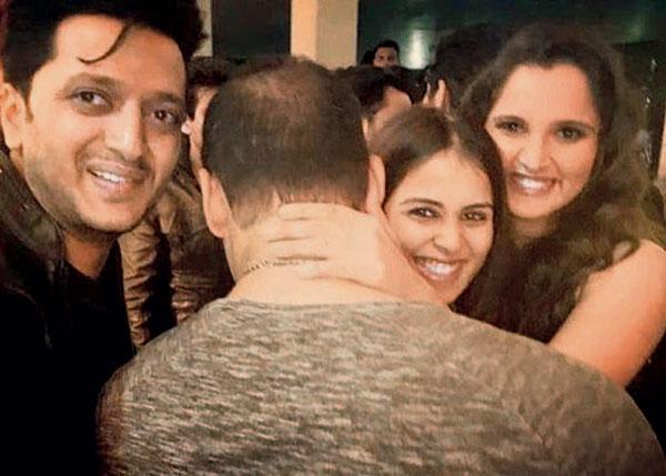 Salman Khan posing a la Vin Diesel with Sania Mirza, Genelia and Riteish Deshmukh; posing for the media; and taking a selfie with a guest with Iulia Vantur in the background. pics courtesy/social media  