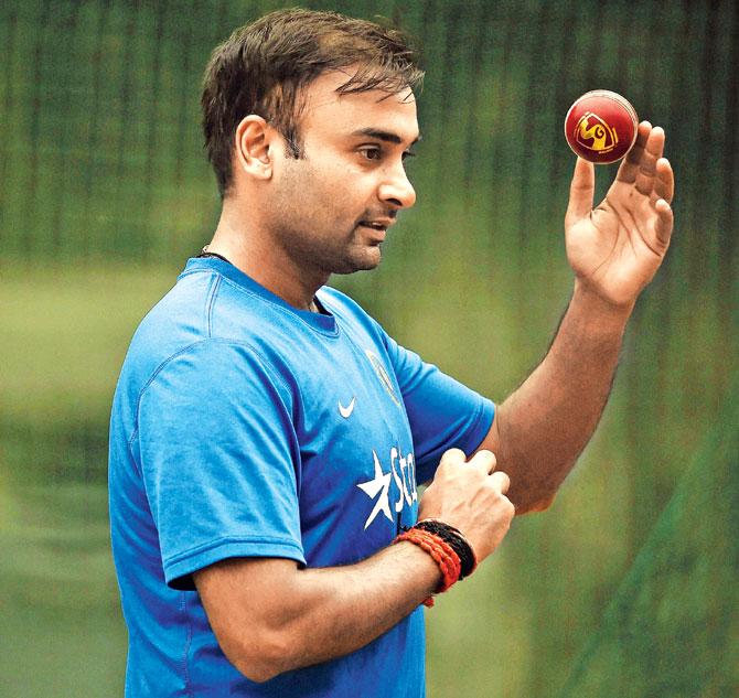 Amit Mishra prepares to bowl during a training session yesterday. Pic/AFP