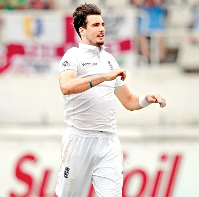 Steven Finn celebrates a Proteas wicket on Day 4 yesterday. Pic/AFP