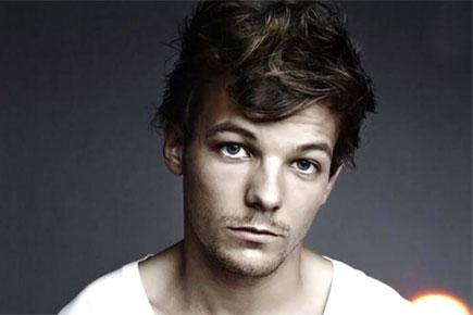 Louis Tomlinson, rumoured girlfriend 'really into one another'