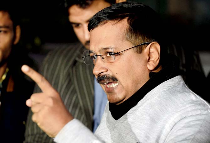 Delhi Chief Minister Arvind Kejriwal addresses the media after the CBI raided his office headquarters yesterday. On Twitter, Kejriwal said: ‘Modi is a coward and a psycopath’. Pic/AFP
