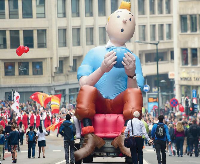 An inflatable balloon of Tintin paraded as part of the annual Comic Book Festival in Brussels in 2014. Pic/Afp